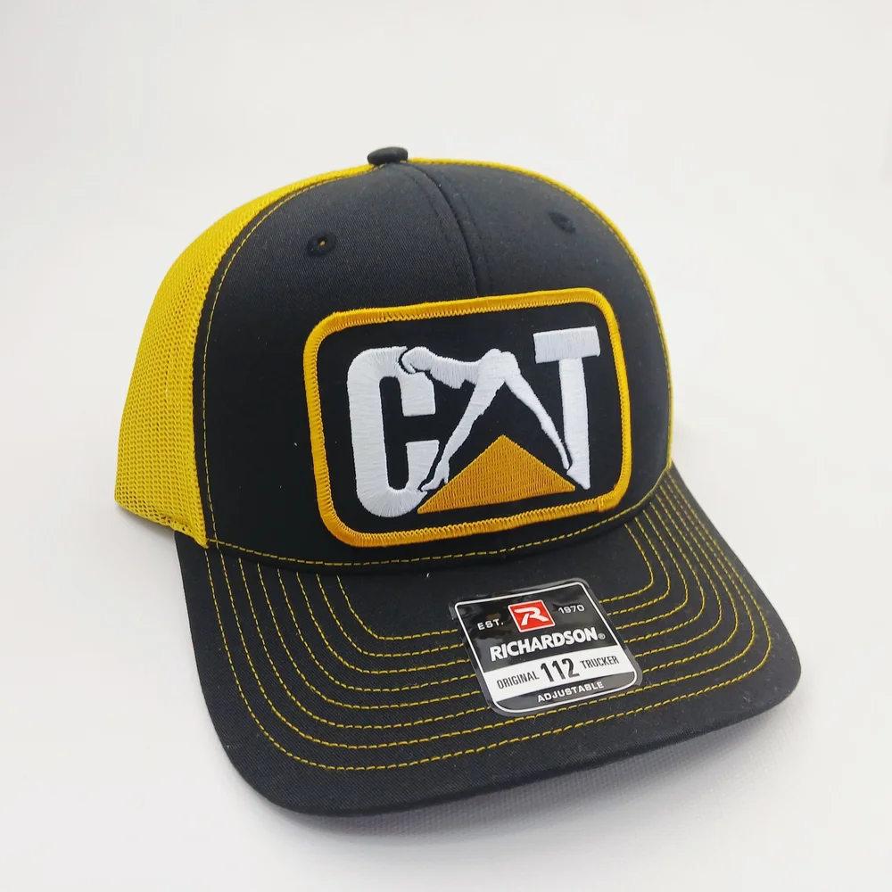 CAT Black and Yellow Richardso 112 Snap Back Trucker Hat